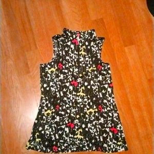 A top with flower design on it